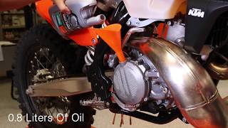 KTM TwoStroke Oil Change  Cycle News [upl. by Delos530]