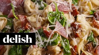 How To Make Tuscan Tortellini Salad  Delish [upl. by Ilehs]